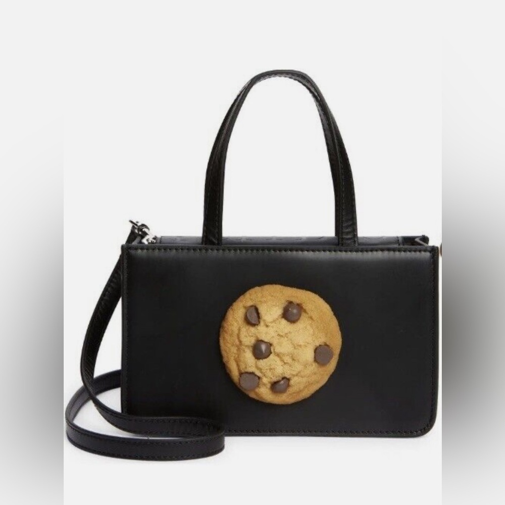 Puppets and Puppets Small Cookie
Top Handle Bag new without dust bag